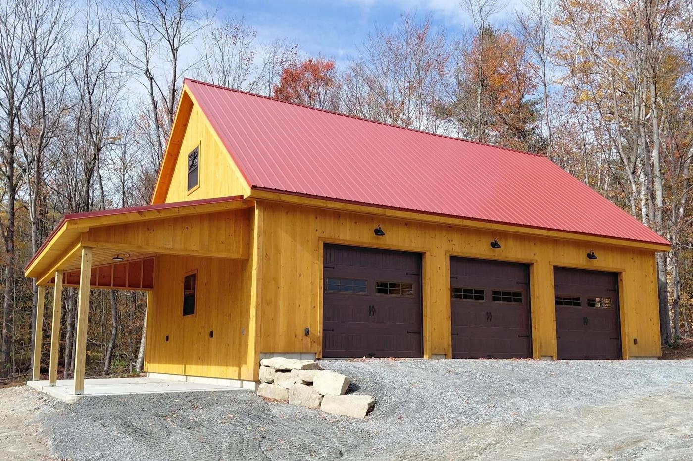 Barn red Tuff Rib Ag metal roof on a garage in Becket, MA