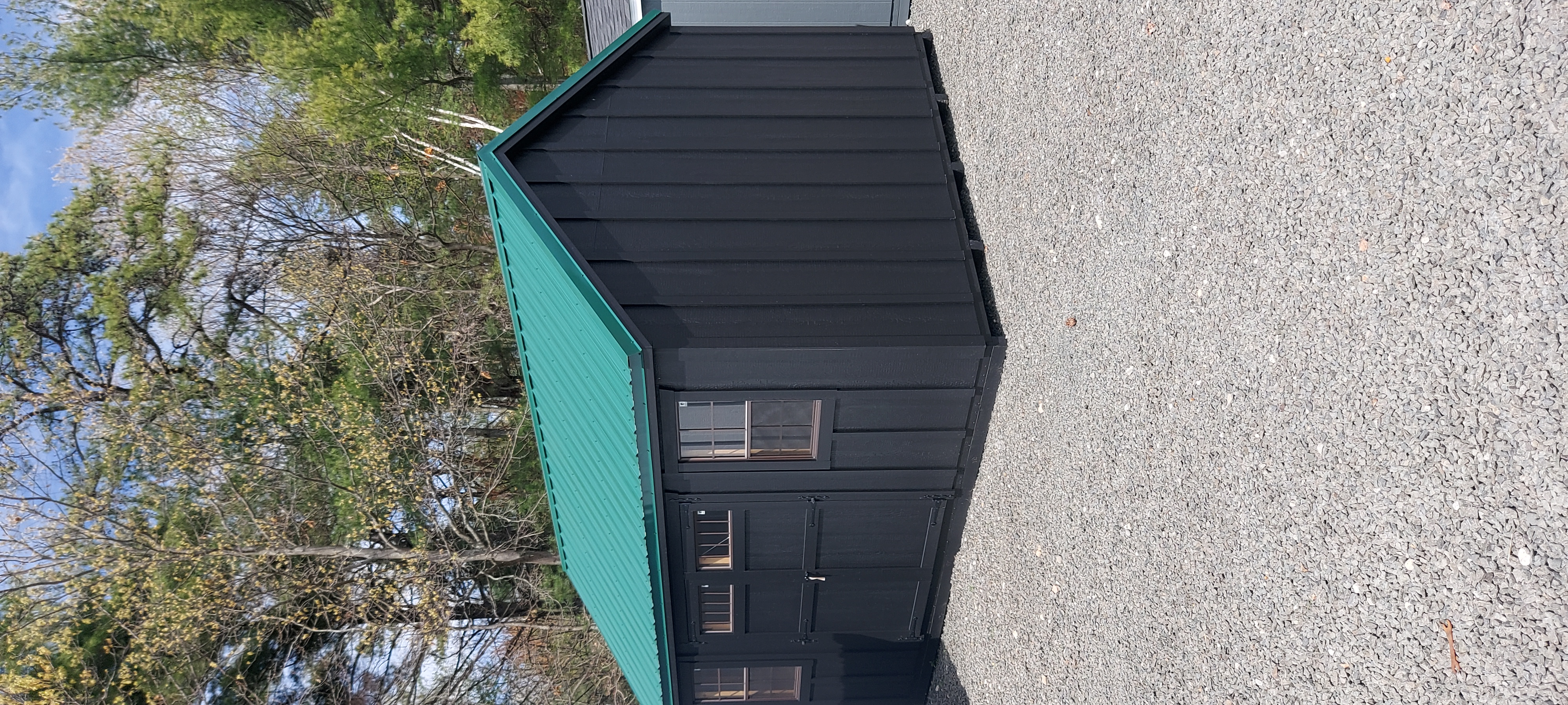 Forest green Tuff Rib Ag metal roof on a shed in Agawam, MA